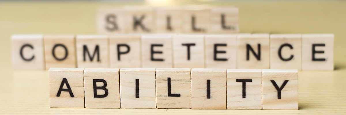 Scrabble game letters spelling: Skill, Competence, Ability
